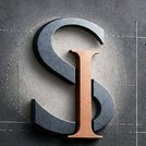 א. סדצקי הנדסה — מונוגרמה SI
